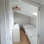 Købmandsgården, *