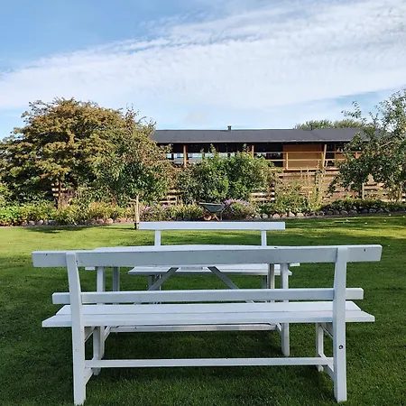 Købmandsgården, *