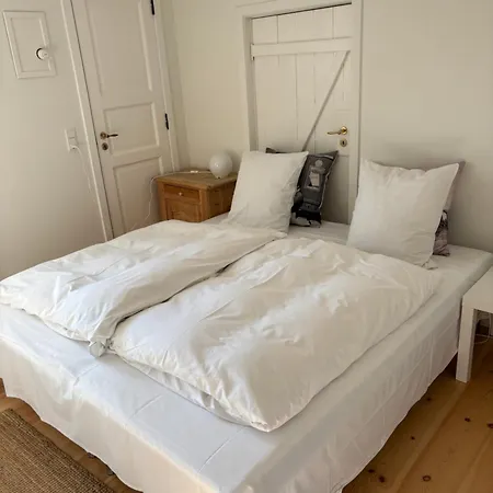Købmandsgården, Lejlighed *