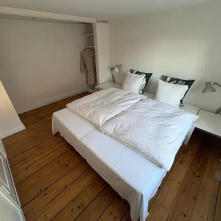 Købmandsgården, Lejlighed *